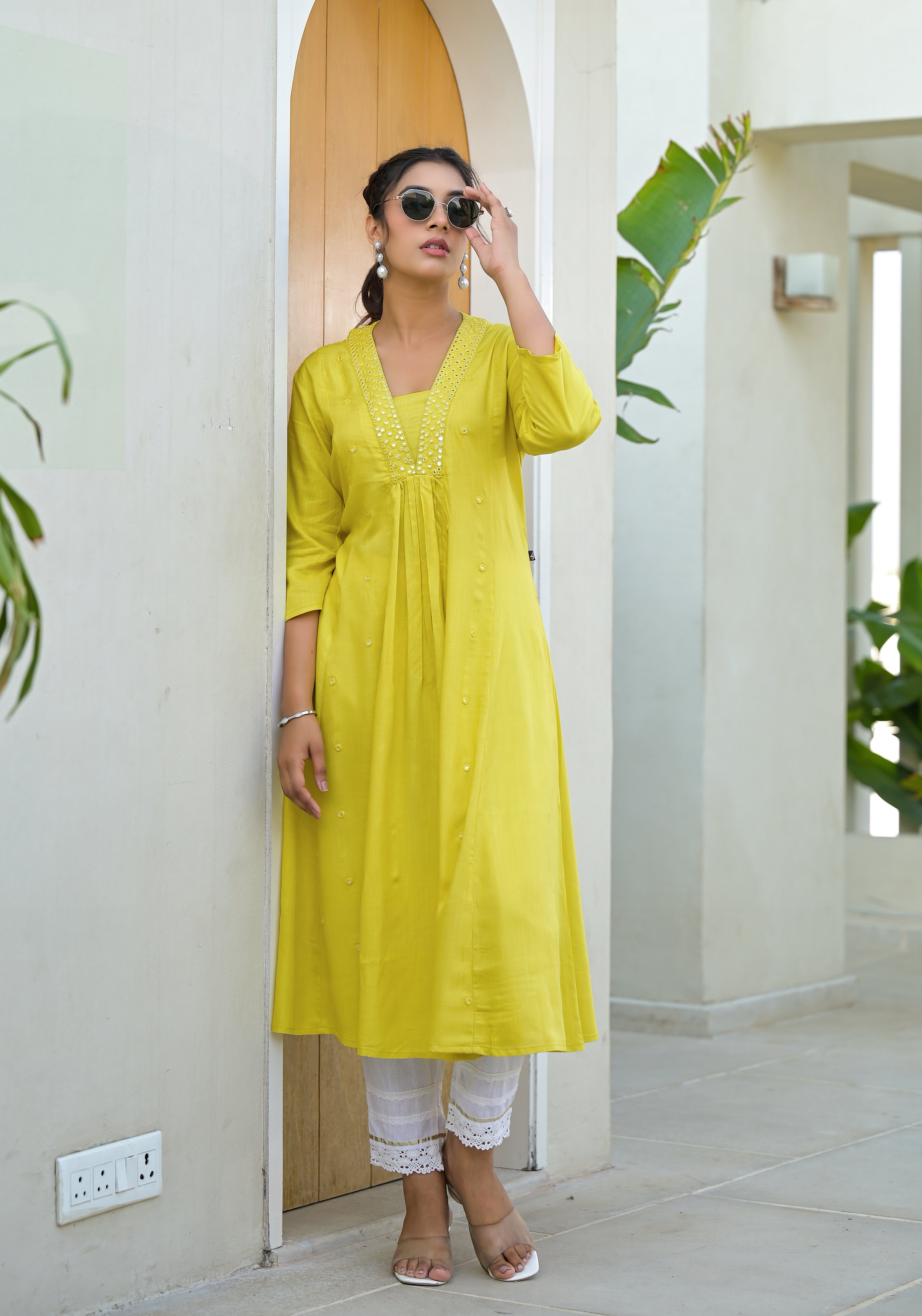 Yellow Solid Liva Rayon Kurta With Mirror Work