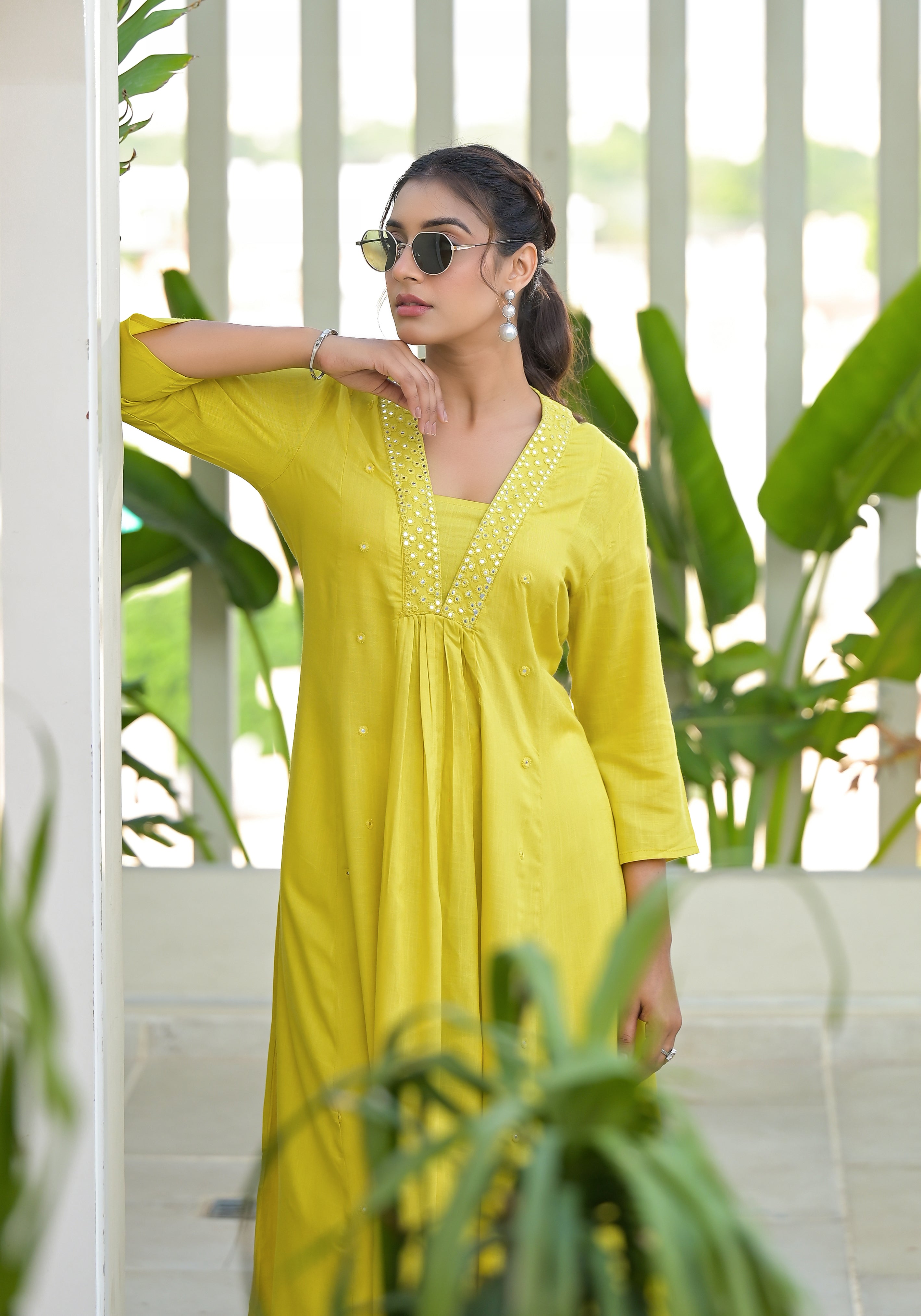 Yellow Solid Liva Rayon Kurta With Mirror Work