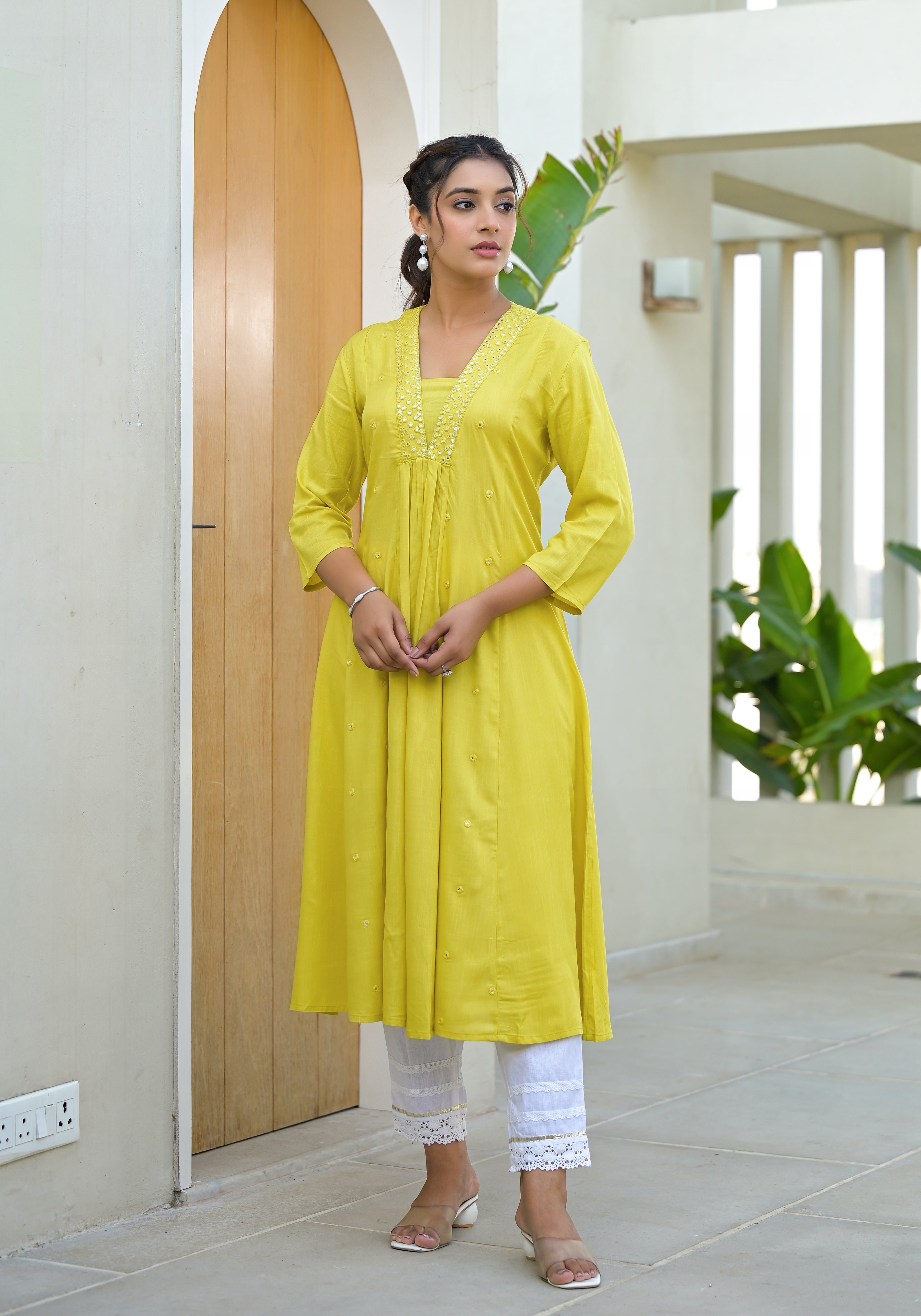 Yellow Solid Liva Rayon Kurta With Mirror Work