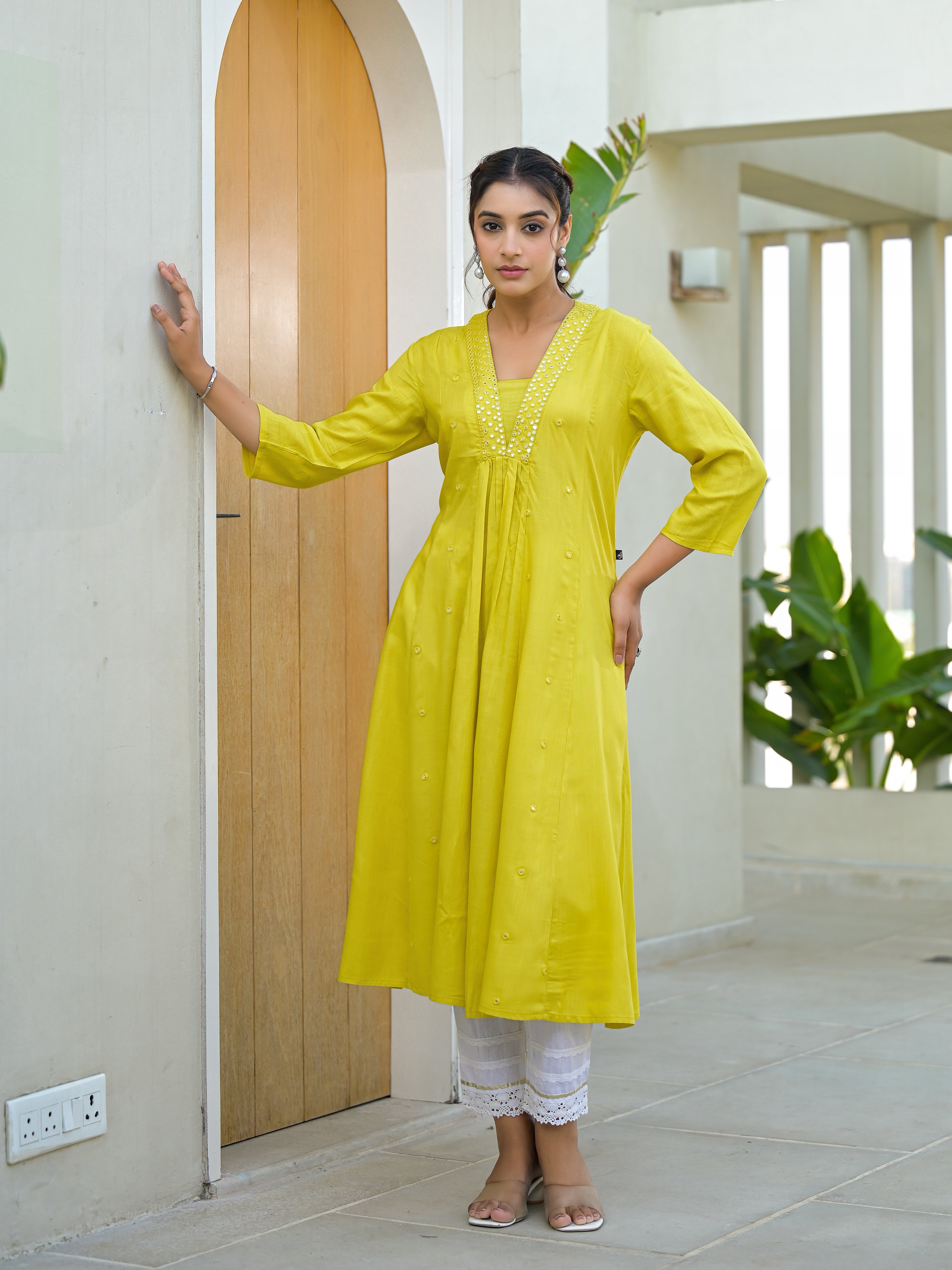 Yellow Solid Liva Rayon Kurta With Mirror Work