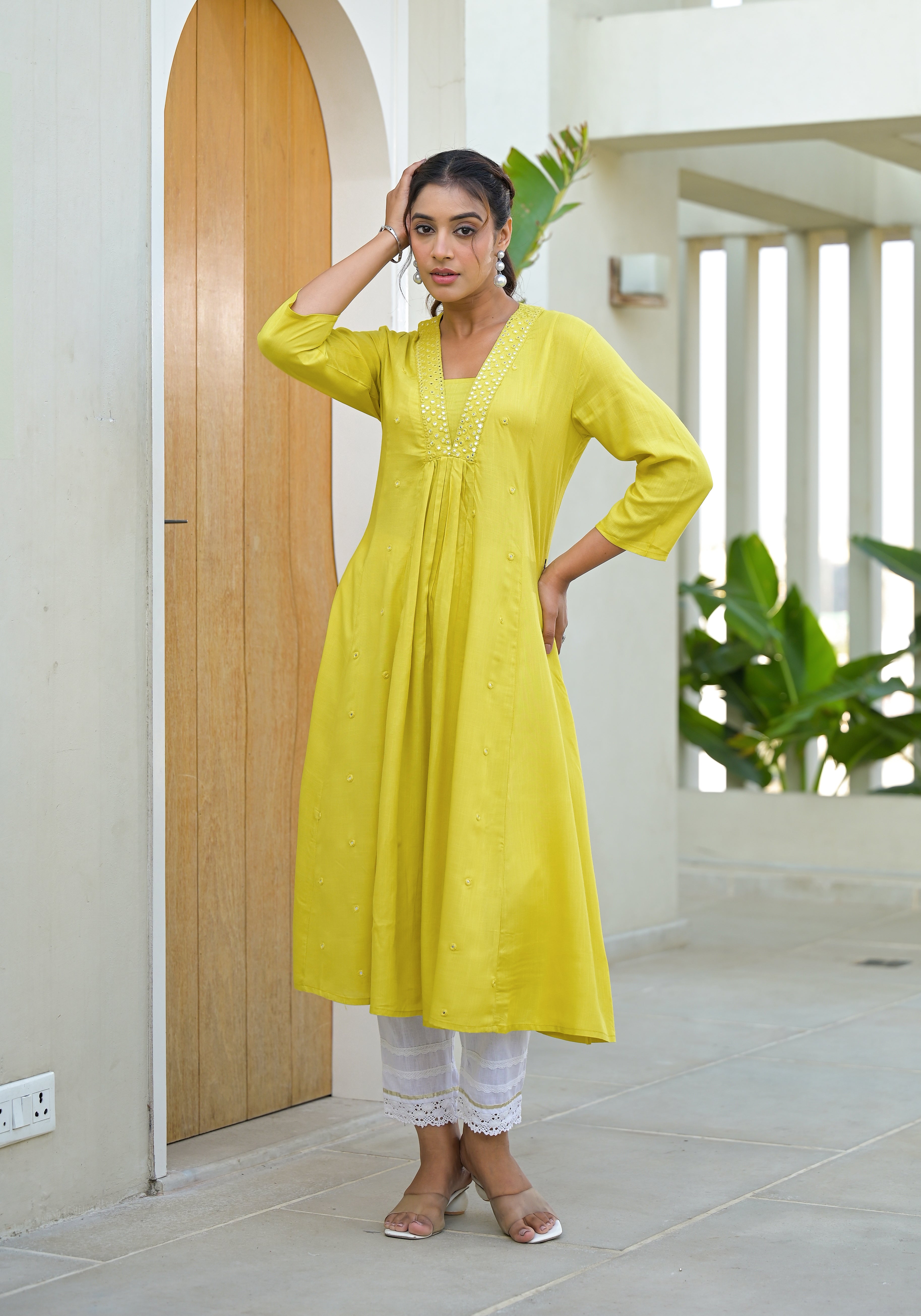 Yellow Solid Liva Rayon Kurta With Mirror Work