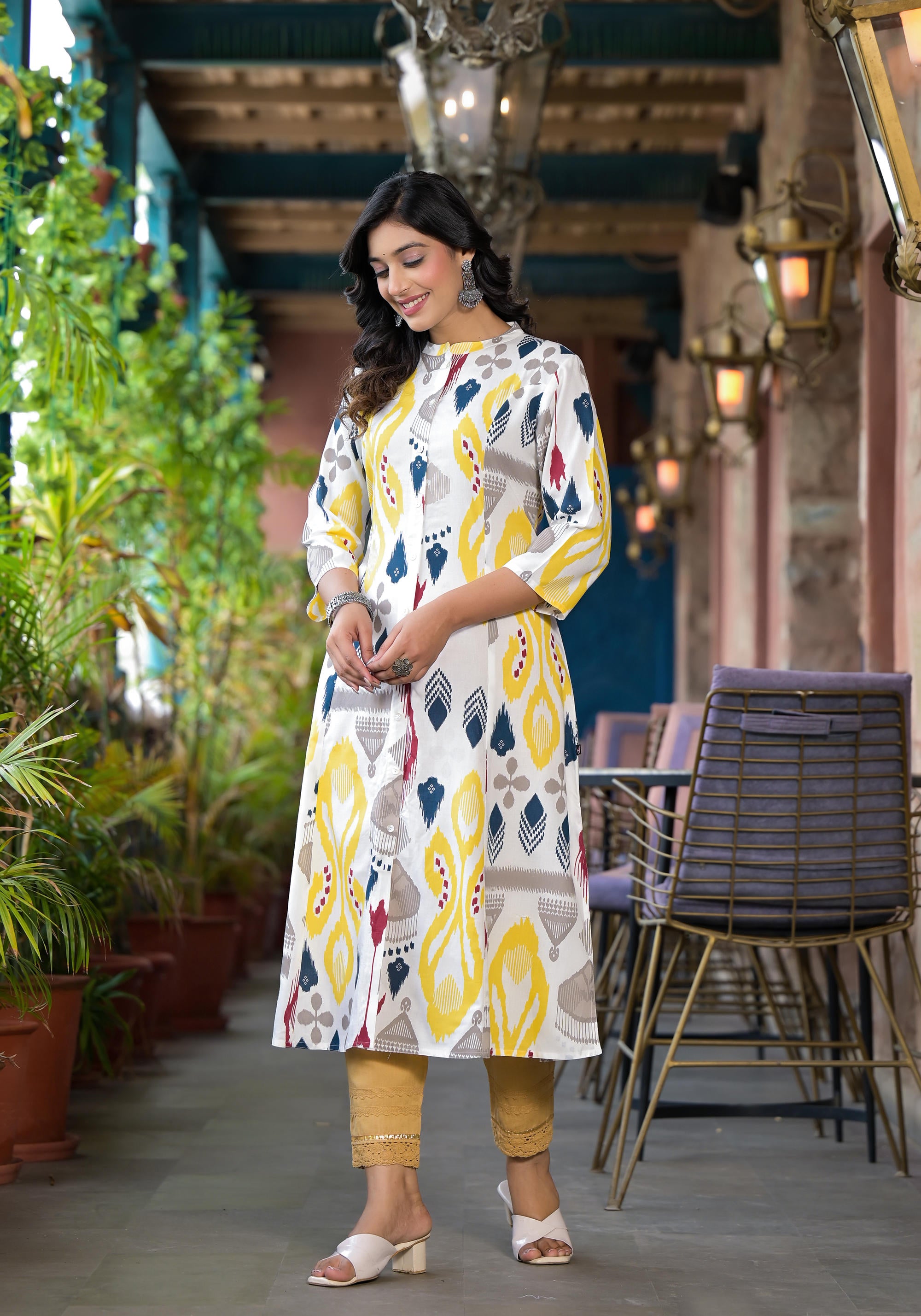 Yellow Ikat Printed Liva Rayon Women Kurta With Button Closure