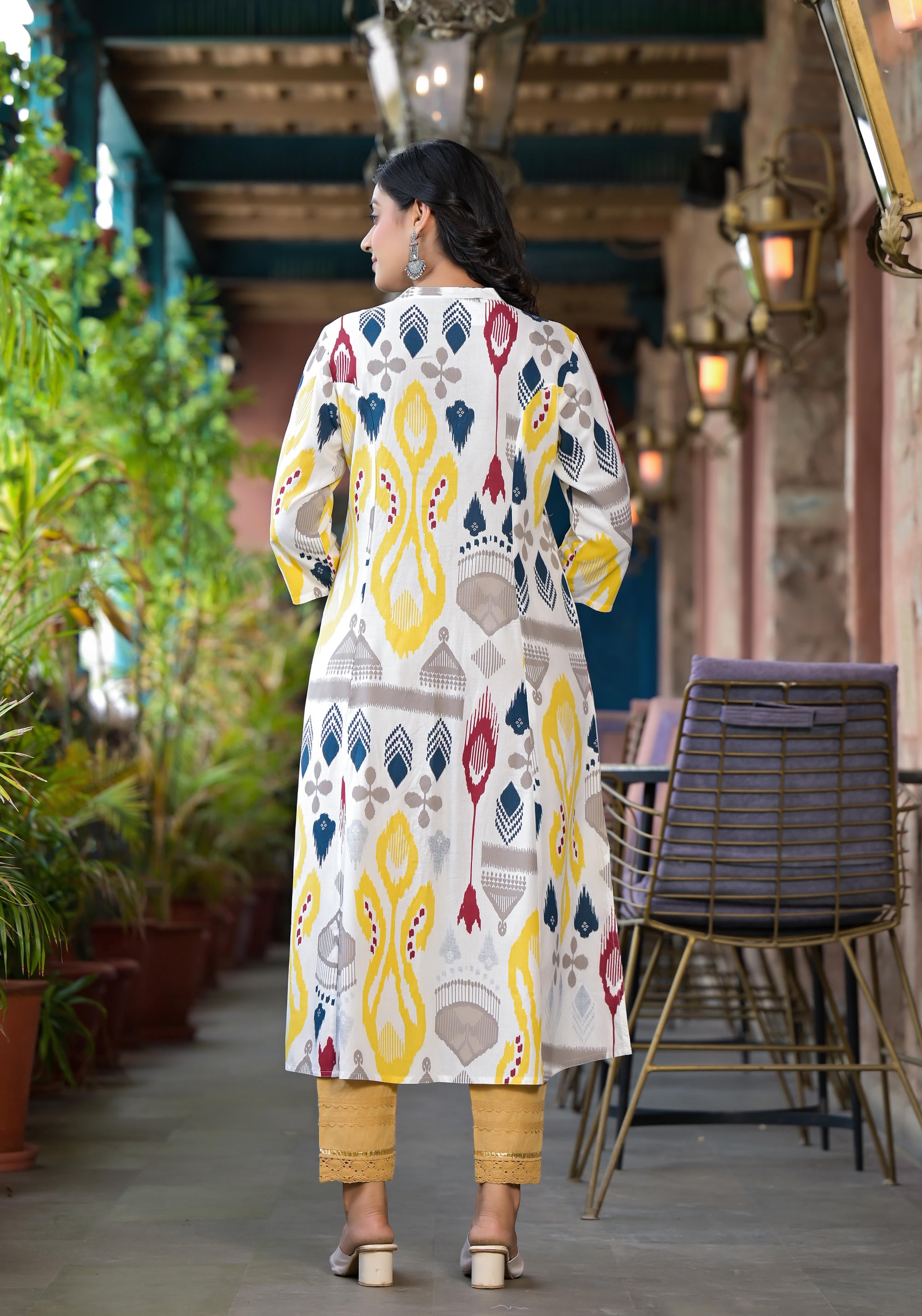 Yellow Ikat Printed Liva Rayon Women Kurta With Button Closure