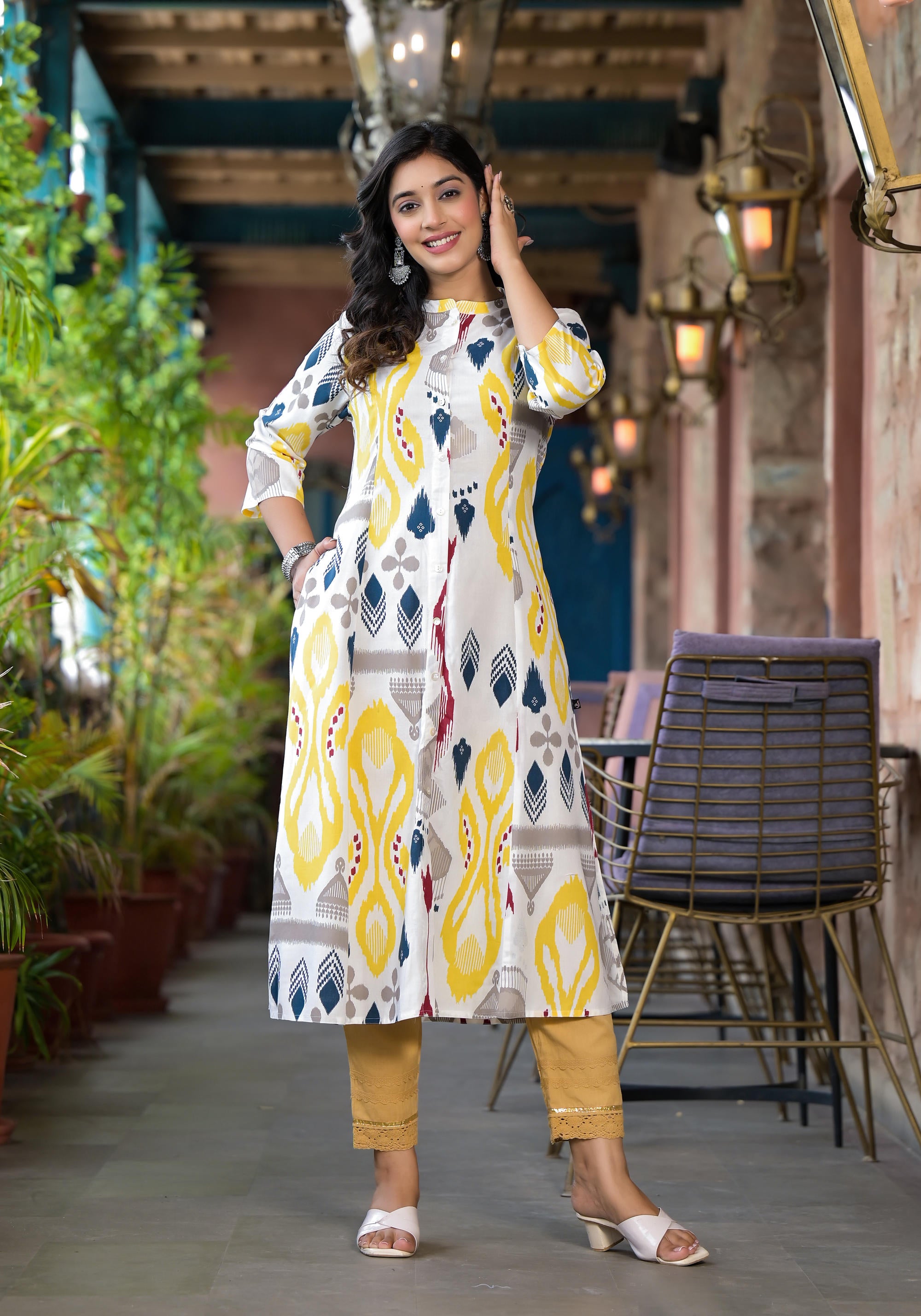 Yellow Ikat Printed Liva Rayon Women Kurta With Button Closure