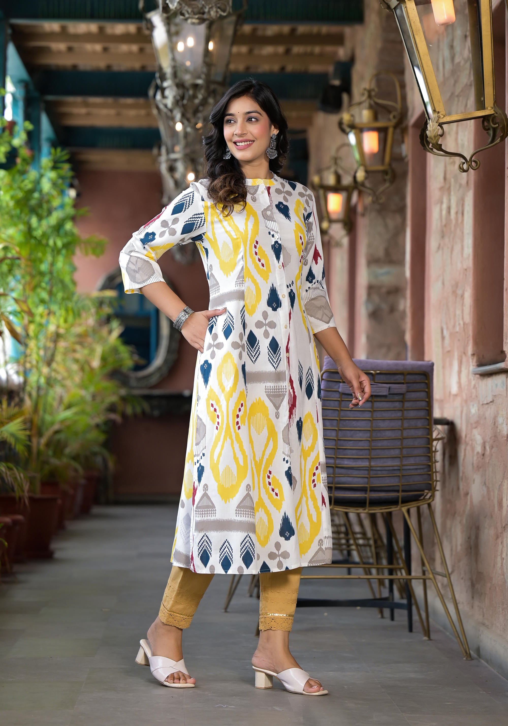 Yellow Ikat Printed Liva Rayon Women Kurta With Button Closure