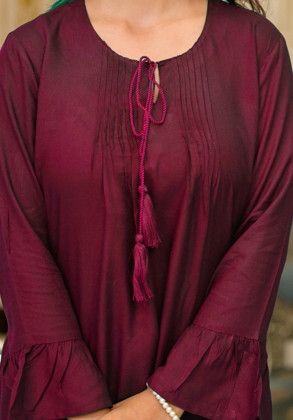 Plum Solid Rayon Top With Tassels & Doris