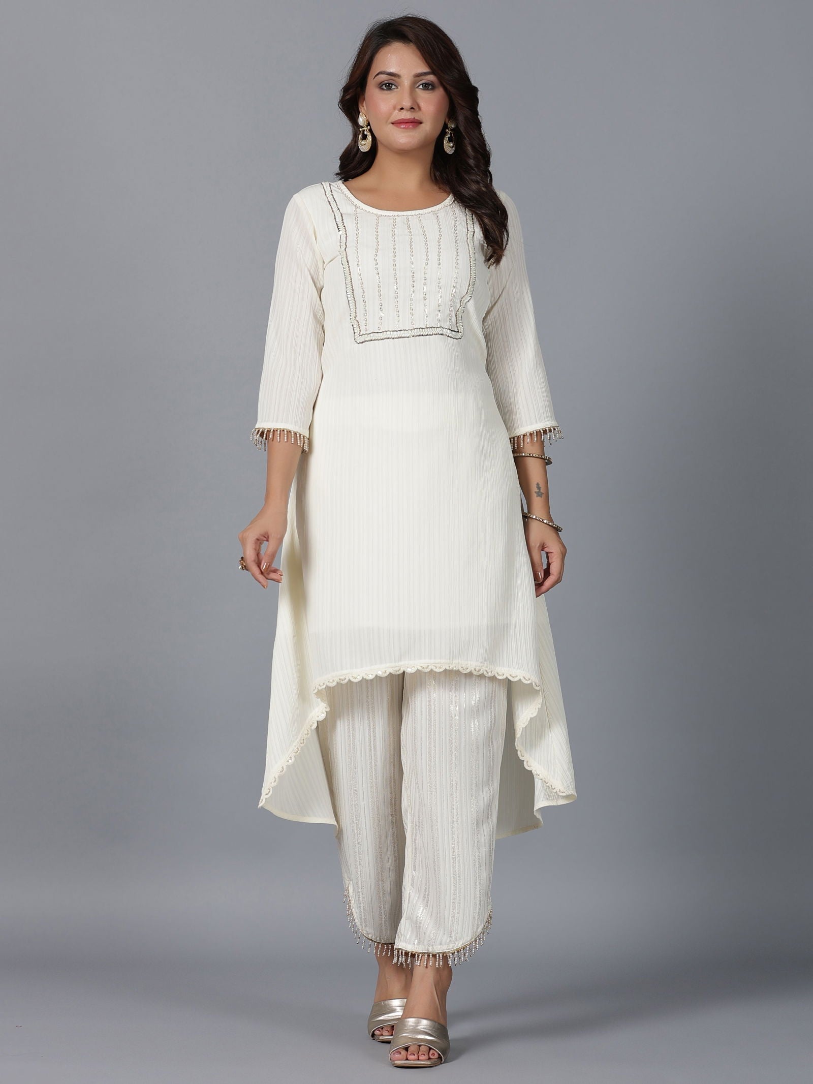 Juniper  Ivory Magnus Embellished High-Low Kurta and Pants Set. 