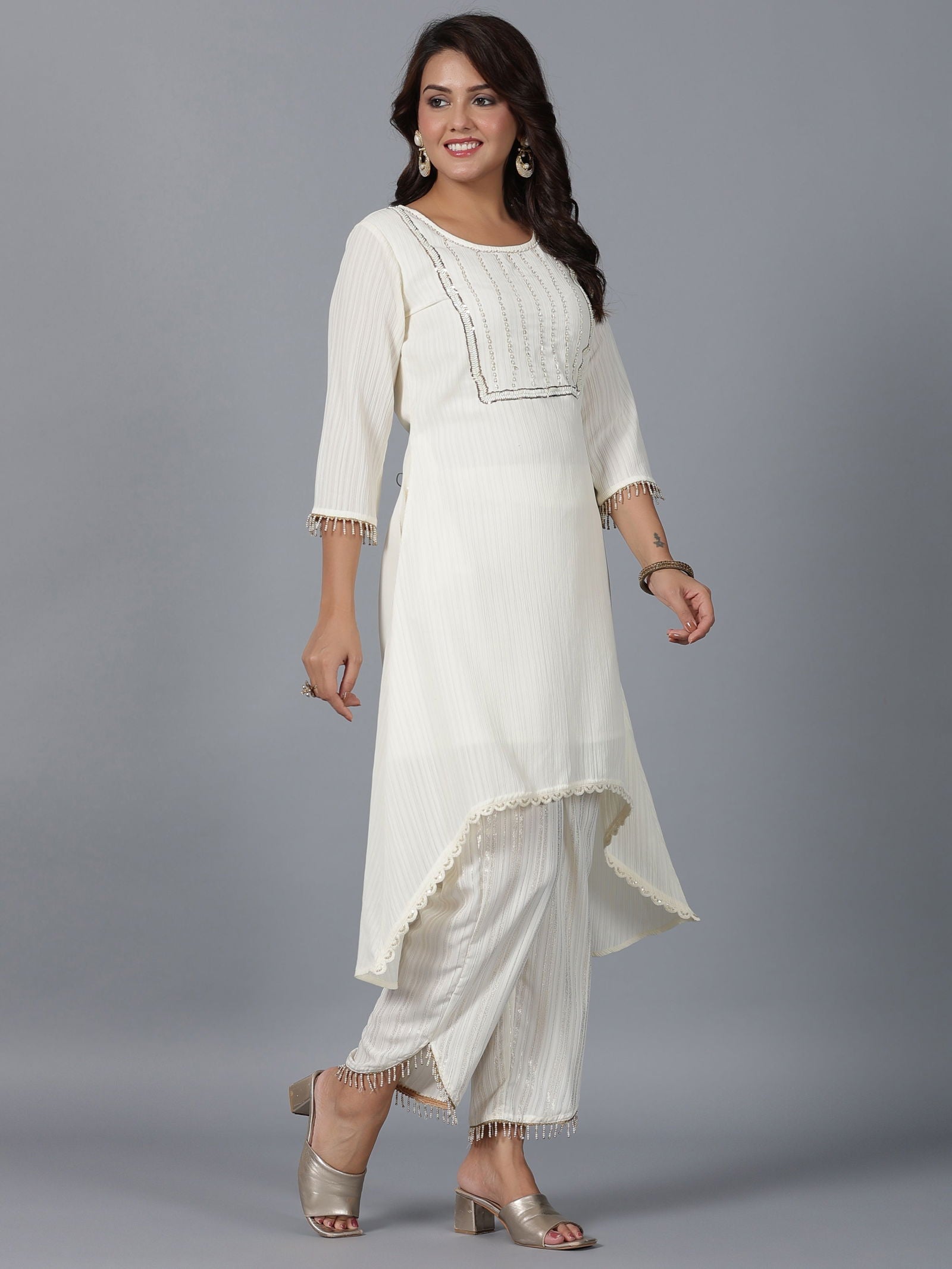Juniper  Ivory Magnus Embellished High-Low Kurta and Pants Set. 