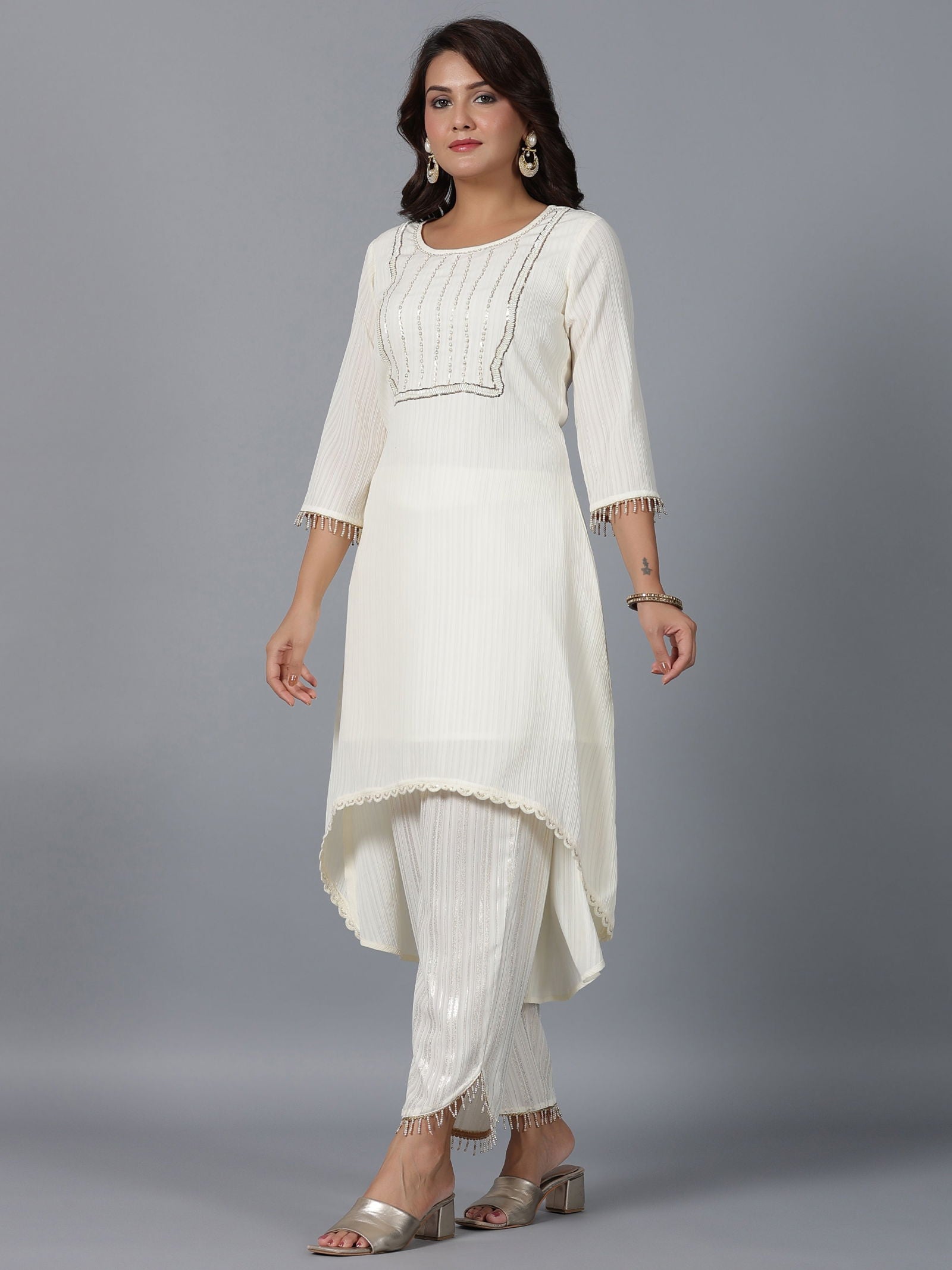 Juniper  Ivory Magnus Embellished High-Low Kurta and Pants Set. 