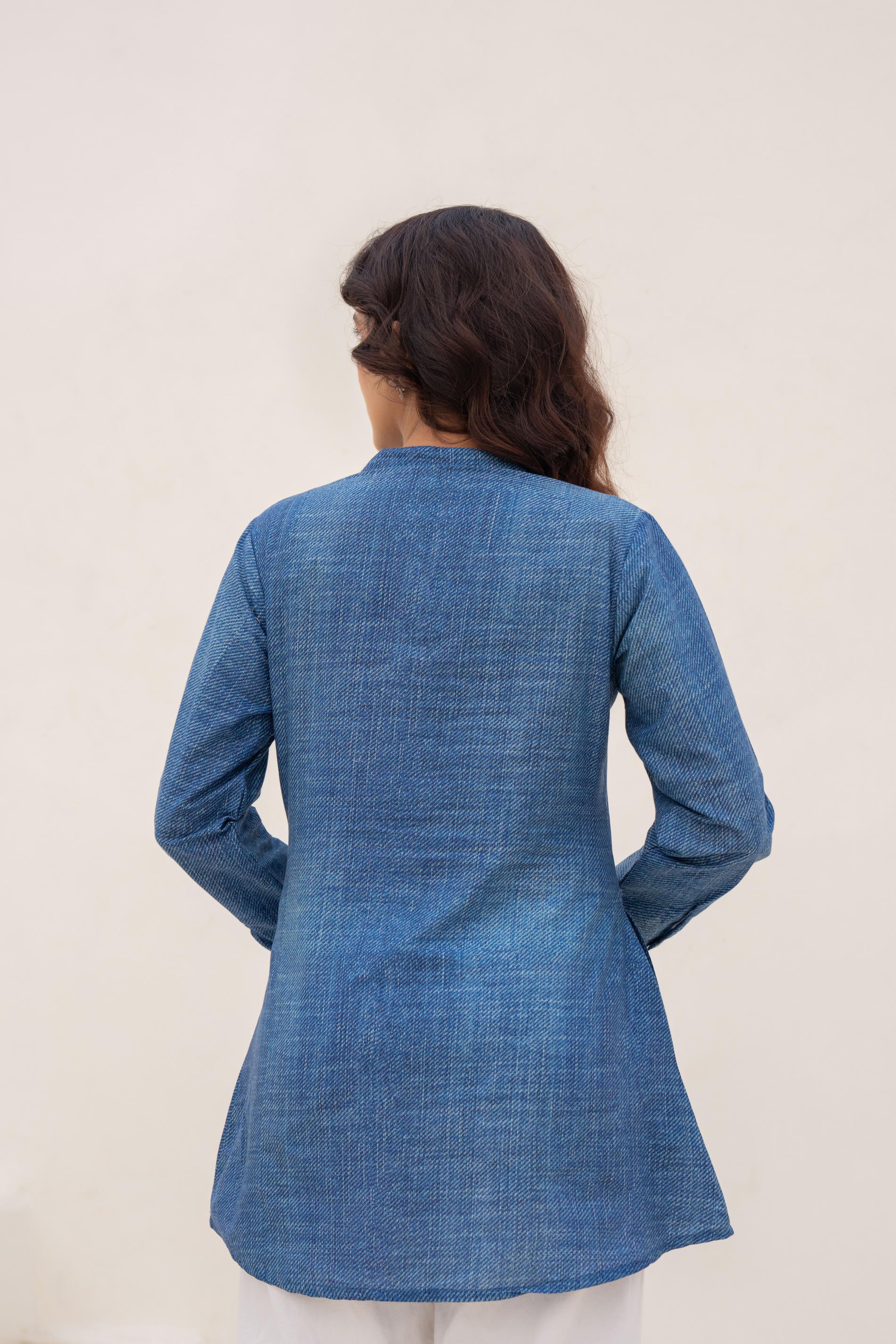 Blue solid cotton tunic with thread work and buttons,