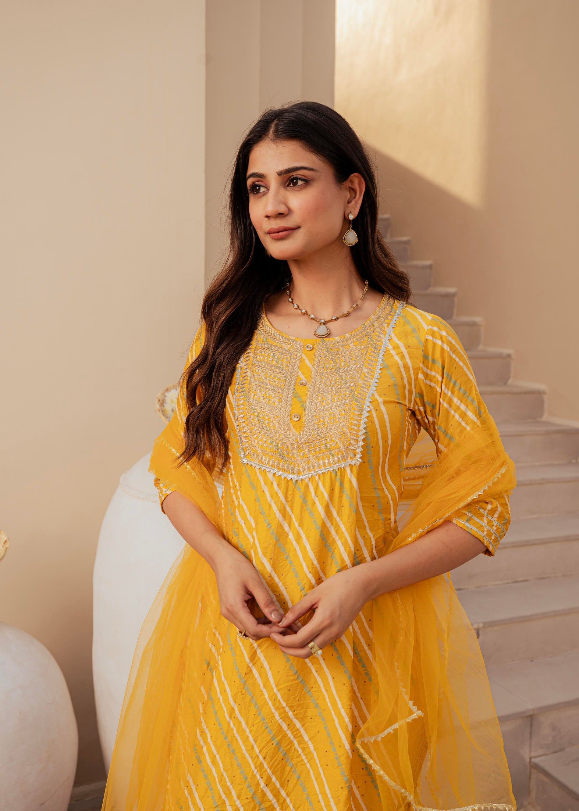 Yellow Bandhej Print Kurta Set with Embroidered Yoke and Net Dupatta