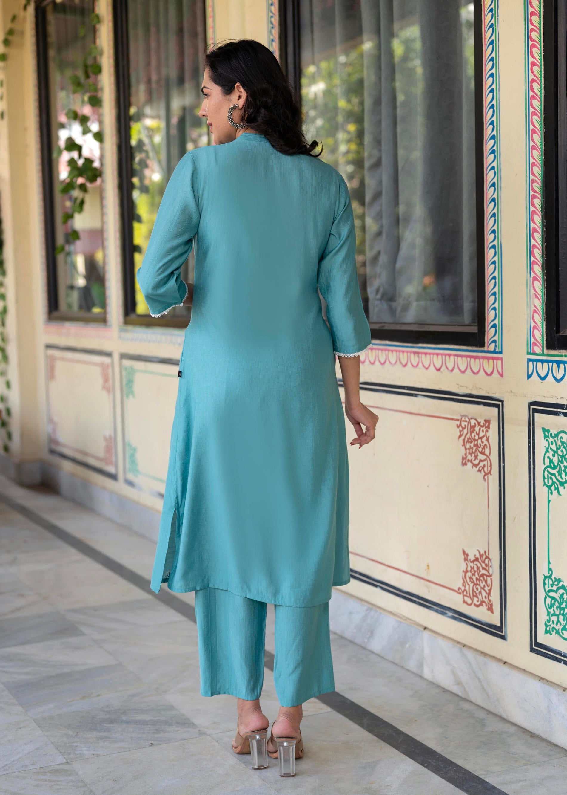 Turquoise embroiderd kurta and  solid bottom with cotton lace