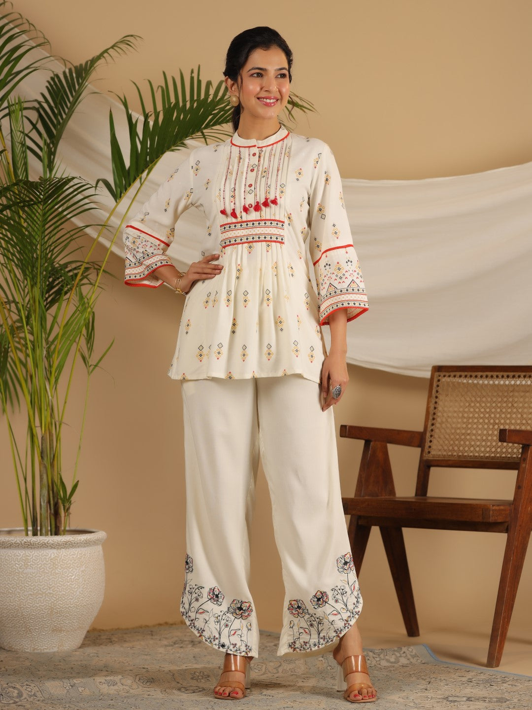 Juniper  Rayon Ivory Tribal Printed A-Line Pleated Co-Ord Set With Sequenced Thread Work