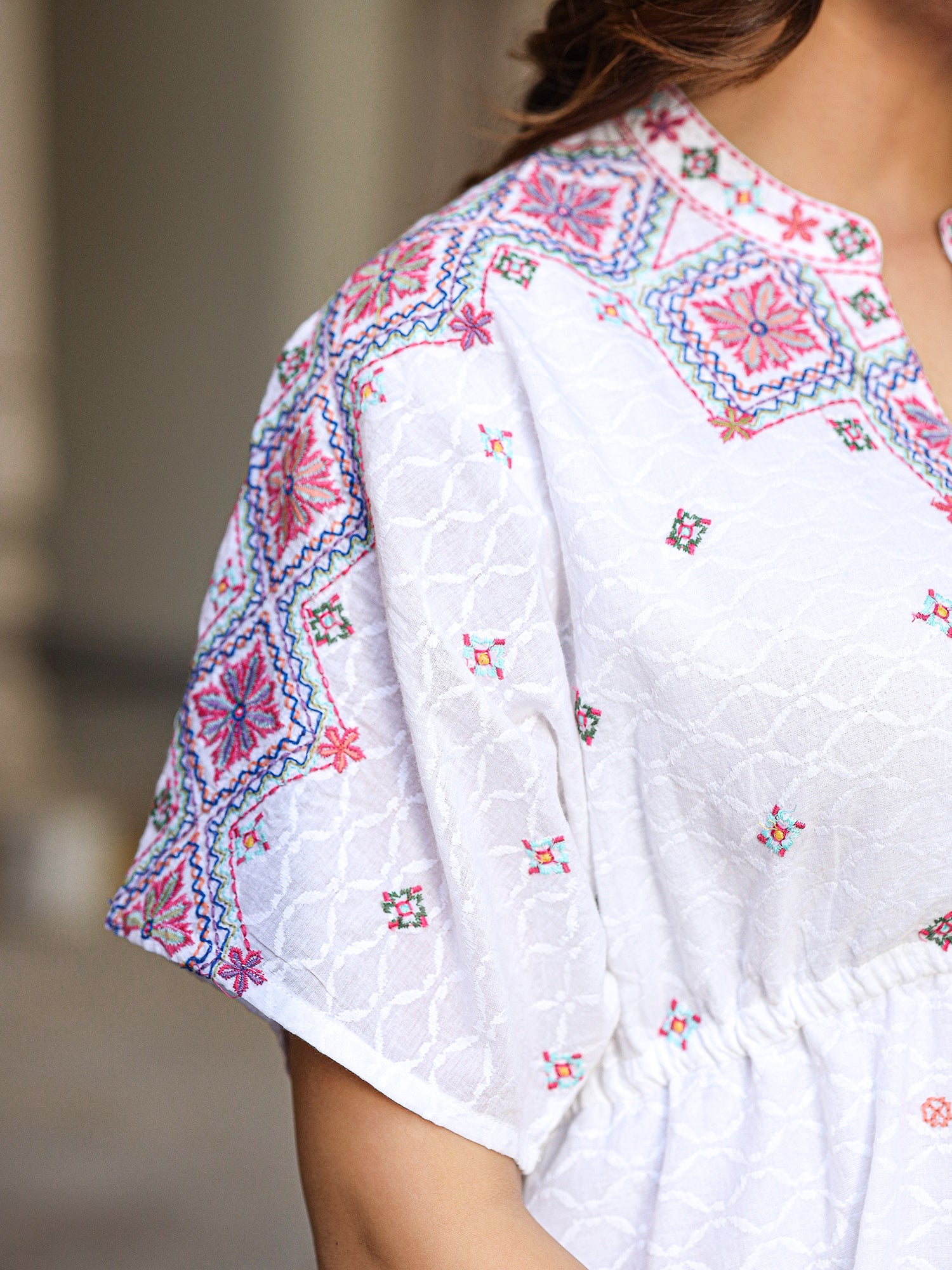 Juniper White Cotton Dobby Asymmetric Peplum Tunic With Multi Colored Thread Embroidery