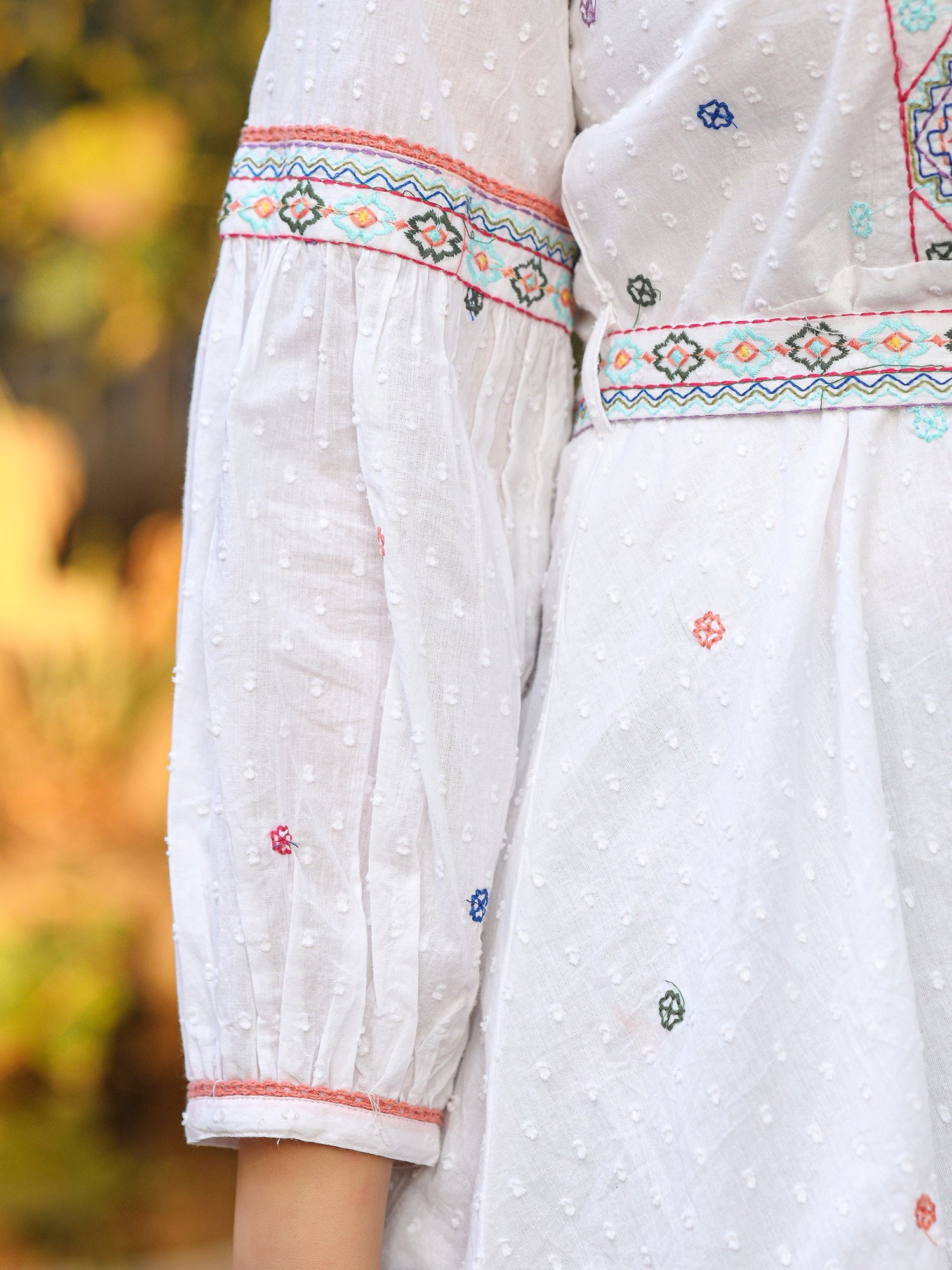 Juniper White Cotton Dobby Peplum Tunic With Multi Colored Thread Embroidery