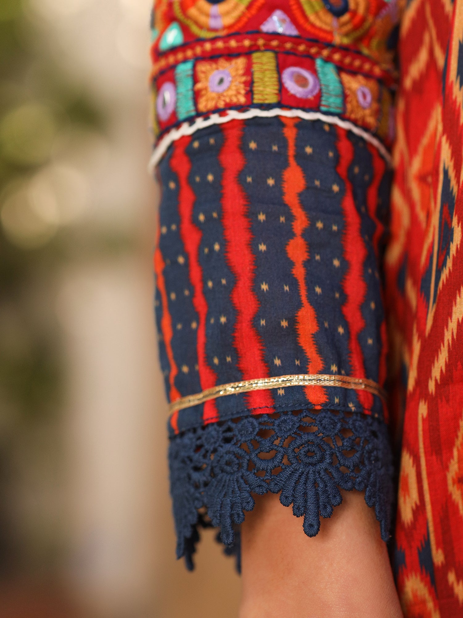 Juniper Rust Cotton Ikat Printed Layered Maxi Dress With Thread Embroidery & Dori Tassel Tie-Up At Waist